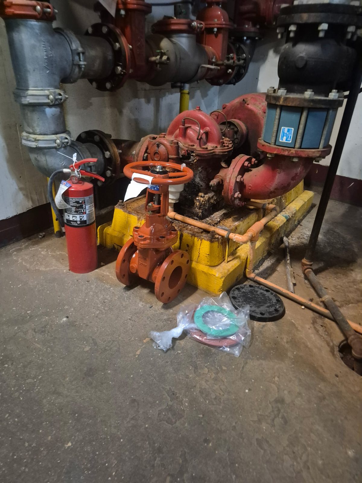 Fire protection valve assemblies staged on the shop floor before installation